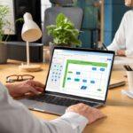 a person using ms visio program on his laptop